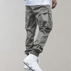 Sommerfeld™ | Herren Cargo Jogginghose – Lila Streetwear-Hose mit Reißverschlusstaschen & Bündchen